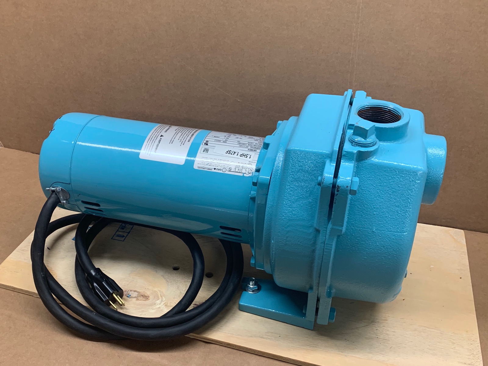 A blue sprinkler pump